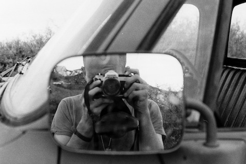 Arty -- so to speak 😉 -- selfie with my Nikon FE2, back when I used a real camera.