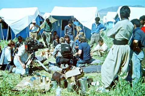 Numerous press agencies interviewing Kurds in a zozan.