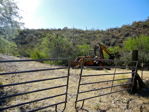 The backhoe has not moved in years.