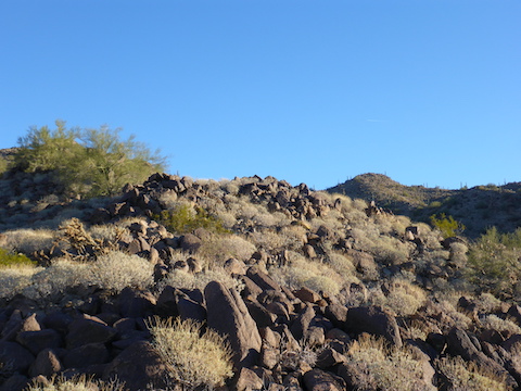 Estrella BM 2766: Heading up the spur towards the far knob. All the rocks made for slow going.