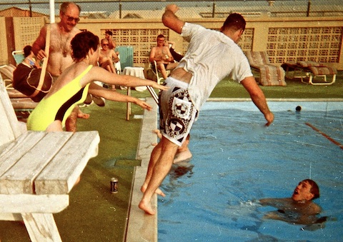 Lynn McGee pushing Matt Fellinger in the pool in Bahrain.
