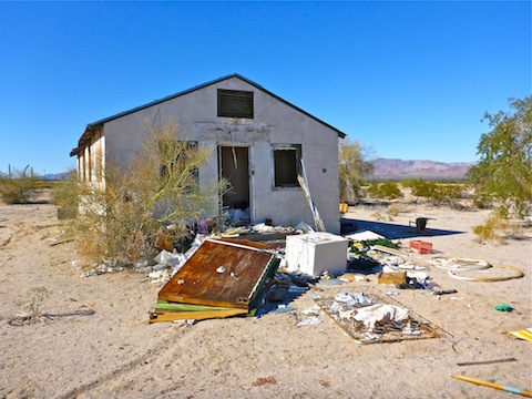 The cabins built by Desert Steve Ragsdale are now used to dump junk and shoot meth.