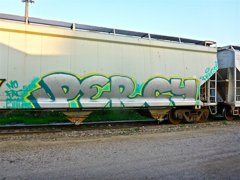 Train in Plymouth. Probably tagged elsewhere, as Plymouth is a typically clean & orderly small Wisconsin town.