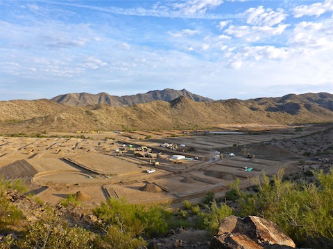 Lots of earth being moved for the gated community which lies just a few hundred feet east of the South Mountain Freeway's north bound lanes. Maricopa Peak in the distance.