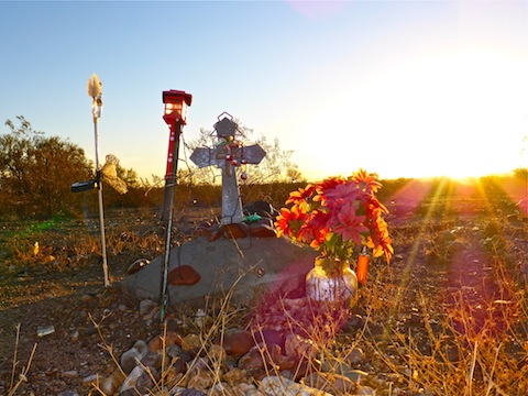 The morning sun shines on Gabby's roadside memorial on Old Highway 80.