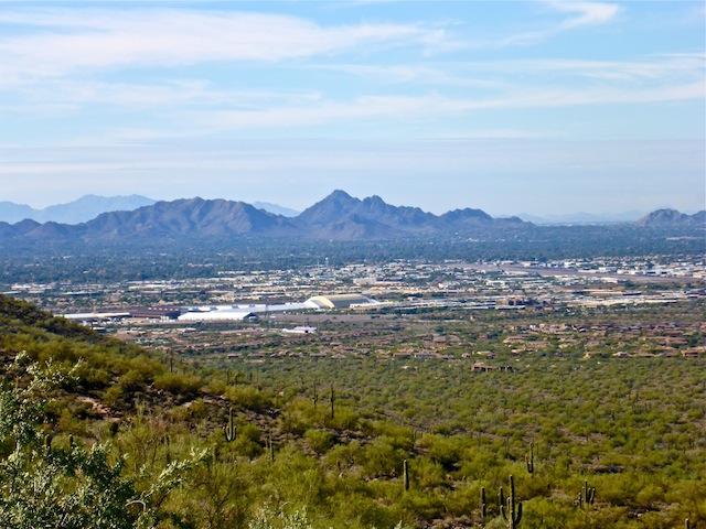 Looking southwest from Windgate Pass Trail, past WestWorld of Scottsdale (middle left) and Scottsdale Airport (middle right), towards Piestewa Peak. 13 miles distant.