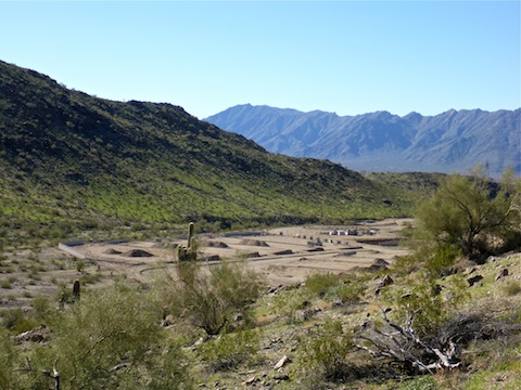 Looking southwest, from the Gila Trail towards the east end of the luxury development. Main Ridge South on the far side. Sierra Estrella in the distance.