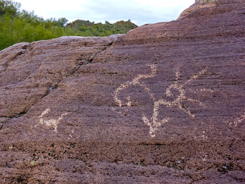 The petroglyph on the left is a deer. I have no clue what the psychedelic design is on the right.