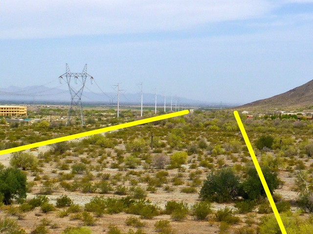 Looking northeast along the Loop 202 right-of-way, from WP-16, at the foot of Main Ridge North. Vee Quiva Casino (left) and what remains of the Dusty Lane community (right). The near wash will be Multiuse Crossing #3.