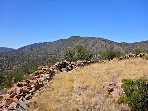 Looking west, along the south wall. The cache is in the corner.