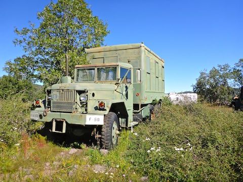 F-59, 81-181 BSB, M809 5-ton 6x6, in what looks like command configuration. The 5th wheel trailer is in back.