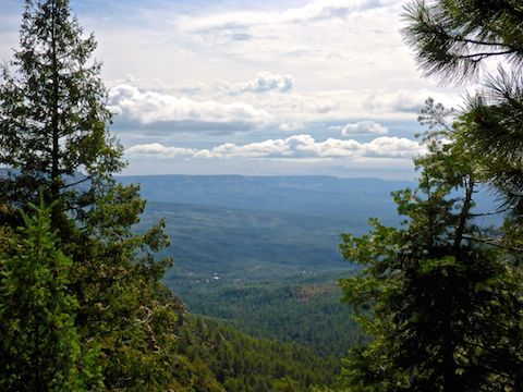 This magnificent view of the Mogollon Rim is 2½ miles down Milk Ranch Point Rd. The white buildings in the lower middle are Camp Geronimo.