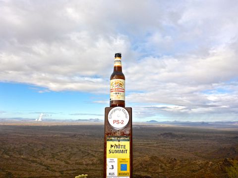 My Kirin Ichiban hiking beer on Pyrite Summit. Steam from the Palo Verde Nuclear Generating Station is visible on the left.