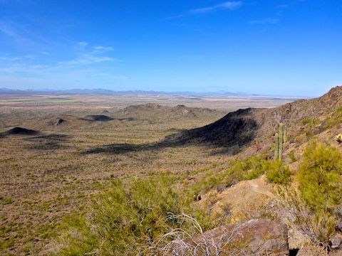 From the bottom of the first cable climb, looking west across the Santa Cruz River valley, towards the distant Sawtooth Mountains / Ironwood Forest National Monument.