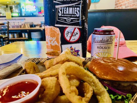 Steam-cooked "Zonie" Hatch green chile burger, onion rings and Telluride Brewing Co. "Mountain Beer Kölsch" at Steamies.