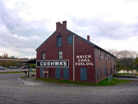 This restored warehouse at Cushwa Basin was once a major dock, and one of the few places on the C&O Canal where a boat could turn around. It is now the Williamsport Visitors Center. Note the flood gauge: In 1936, the Potomac River crested 48.6 ft. above normal -- roughly the top of the word "Brick".