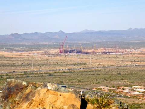 On the summit of Western Vista, looking northwest across the Black Canyon Freeway to the $12 billion Taiwan Semiconductor chip fab due to come online in 2024. Beyond that is Biscuit Flat, where the Black Canyon Trail begins.