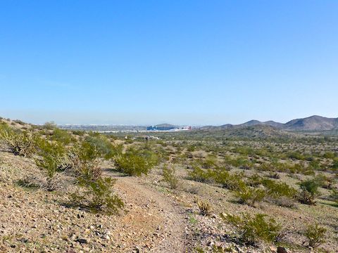 First sight of PIR, 2¼ miles away, but with 3½ miles to hike on Desert Rose Trail. (Including across that hill on the right.) I haven't been to a race since Road America -- before the Chinese Lung AIDs.