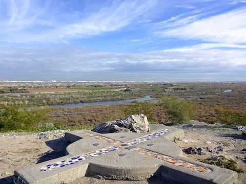 Looking northeast across Tres Rios Wetlands, and the Salt River, from the summit of Monument Hill. The blue mosaic is the east-west baseline (thus Baseline Rd.), while the orange mosaic is the north-south meridian.