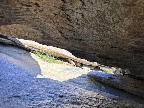 This slick rock crevice between Fatman's Pass and Hidden Valley is 18" high, and horizontal,so it was easy to slide through.