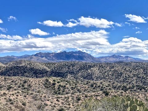 Just eight minutes before the first photo, looking southeast at Pinnacle Ridge in the Santa Teresa Mountains.