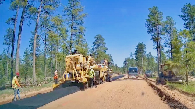 Construction on Rim Road at Carr Lake Trailhead and FR 9350. (Before Rim Road was paved.)