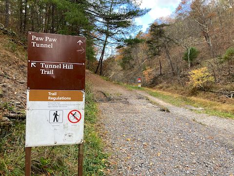 North end of Tunnel Hill Trail in Tunnel Hollow. C&O Canal towpath on the right. Hiking a loop of Tunnel Hill Trail and Paw Paw Tunnel is 3.3 miles, 370 ft. AEG.