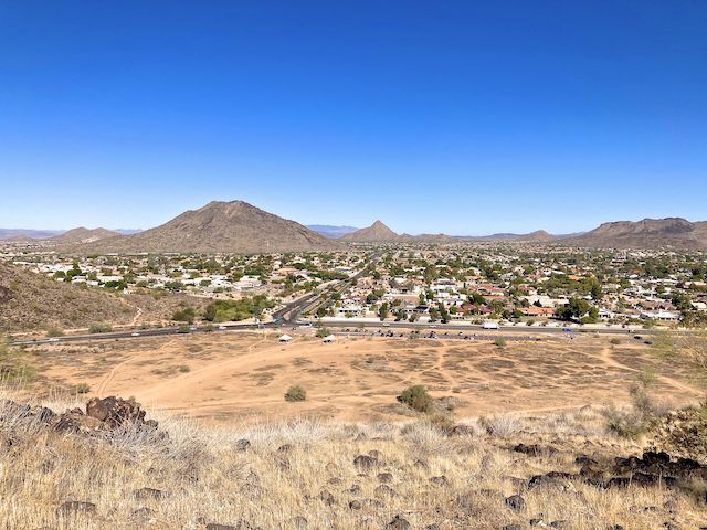 Looking north from Arrowhead Point Trail, across Pinnacle Peak Rd., towards -- left to right -- Keefer Hill, East Wing Mountain, Ludden Mountain, Pyramid Peak, and the Deem Hills.