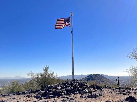 From the Arrowhead Point summit, looking east to the distant McDowell Mountains (left) and Phoenix Mountains Preserve (middle).