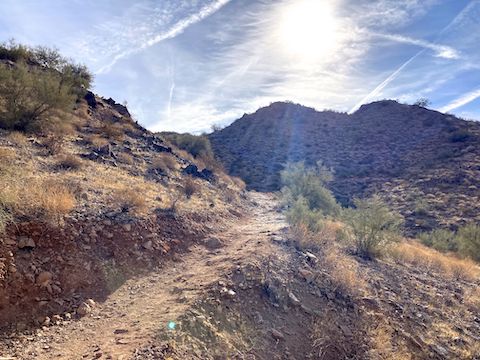 As "difficult" as Dynamite Trail gets. Was in shadow until the peeked over Goldmine Mountain.