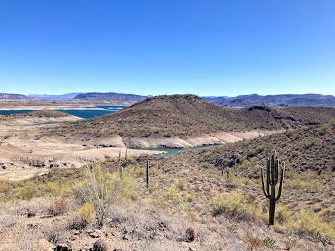 Helm’s Island’s isthmus (~1694 ft. el.), on the left, whould be covered, or at least wet, if the resevoir was at capacity. Instead, Lake Pleasant’s water level was 1,667 ft. (But up nine feet since bottoming out a month ago.)