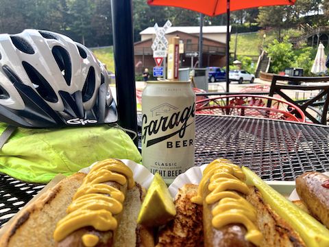 Already refreshed with one beer, I’m about to dig into Tunnel Hotel’s delicious hot dogs. One would have been enough!