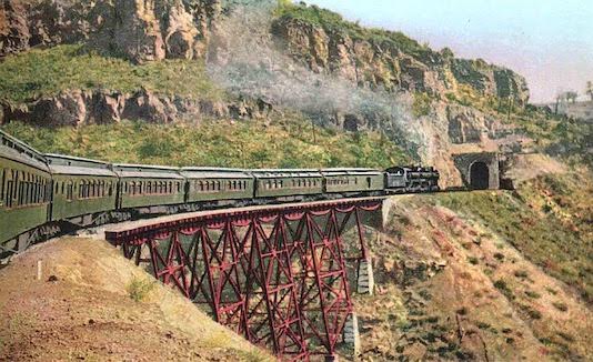 Fred Harvey postcard of the same trestle. Johnson Canyon Railroad Tunnel just ahead.
