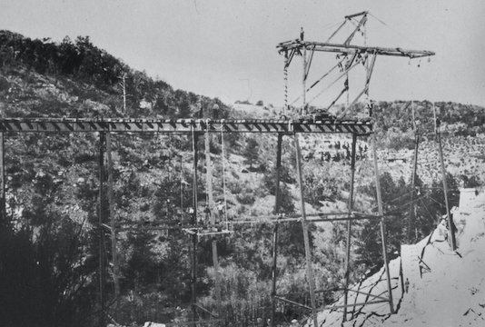 Construction on trestle outside Johnson Canyon Railroad Tunnel's west portal (c. 1882).