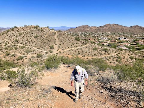 Peoria Sunrise Mountain Preserve: Approaching signpost SM-32. The star intersection, at the base of North Peak Vista, is SM-24. West Wing Mountain in the distance.