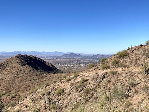 Sunrise Peak: Looking back at Sunrise Trail and canyon shade. 136th Street Spur on the left; Camelback Mountain in the distance.