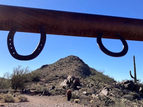 Sunrise Peak, viewed from SR13. Despite appearances, the summit is a rocky 280 ft. climb above whatever this contraption is.