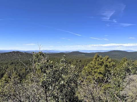 Looking west Mahan Mountain. Jones Mountain & Lake Mountain (middle) hide Stoneman Lake. Bill Back Butte (left) and Fain Mountain (right) to the side.