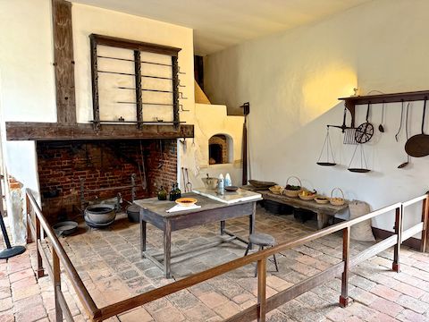 Inside the Mount Vernon kitchen. Visiting the outbuildings is unguided, so each outbuilding has an info sign with the building's history, who worked there, and a quote from George or Martha.
