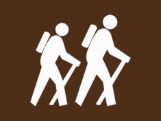 generic white hiker on brown background sign