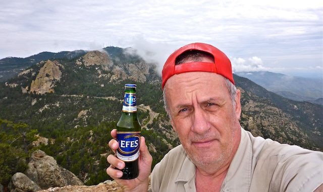 Enjoying an Efes beer on the Green Mountain OP overlooking the Catalina Highway.