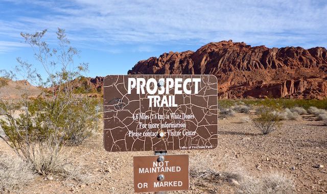 Prospect Trail's south trailhead, on Valley of Fire Highway. Prospect might not be maintained, but it is thoroughly marked: Follow the white pole road! Follow the white pole road!