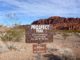 Prospect Trail's south trailhead, on Valley of Fire Highway. Prospect might not be maintained, but it is thoroughly marked: Follow the white pole road! Follow the white pole road!