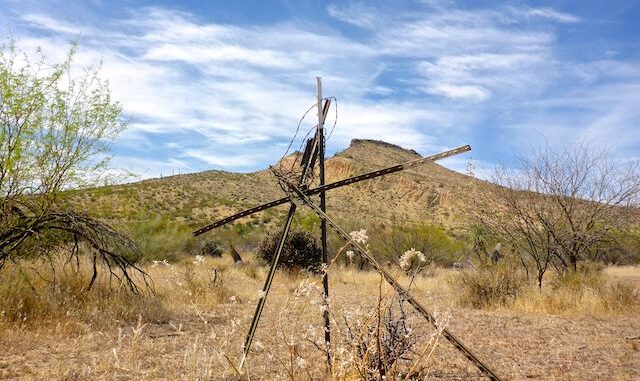 The old fence posts looked like a cross in front of Brown's Mountain.