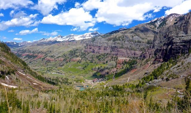 Looking northwest, down Black Bear Pass Rd., past Idarado's Pandora Mill, to the east end of Telluride. I believe the snow-capped mountains are Campbell Peak and Gibson Peak.