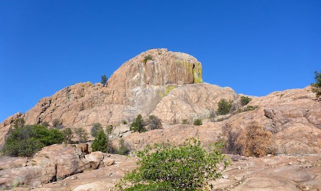 Hill 5630 is the prominent formation at the west end of Iron King Trail.