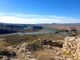 The view from the top of Indian Mesa, looking southeast across Tule Creek, and the Agua Fria River, towards Lake Pleasant (the sliver just in front of the distant White Tank Mountains).