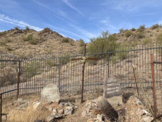 Mansel Carter, and his Cherokee sidekick Marion Kennedy, were mid-20th century prospectors in the San Tan Mountains. When Carter passed in 1987, Queen Creek was still mostly rural. Now, it is a city of 76,000, extending nearly to Florence. The Carter & Kennedy graves are just off Goldmine Trail, ⅓ mile south of Goldmine Trailhead.