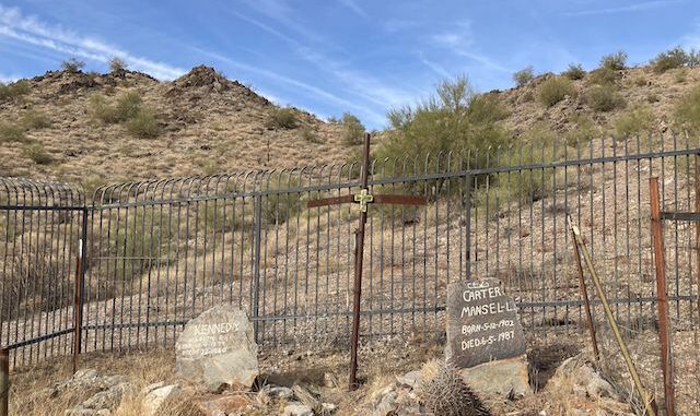 Mansel Carter, and his Cherokee sidekick Marion Kennedy, were mid-20th century prospectors in the San Tan Mountains. When Carter passed in 1987, Queen Creek was still mostly rural. Now, it is a city of 76,000, extending nearly to Florence. The Carter & Kennedy graves are just off Goldmine Trail, ⅓ mile south of Goldmine Trailhead.