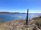 Lake Pleasant: Just below the summit of Yavapai Point, looking southeast across Ariel Island, towards Black Mountain. The TSMC chip fab, Middle Mountain, Pyramid Peak and Ludden Mountain were clearly visible in the distance. New Waddell Dam is behind Scorpion Bay Marina on the right.